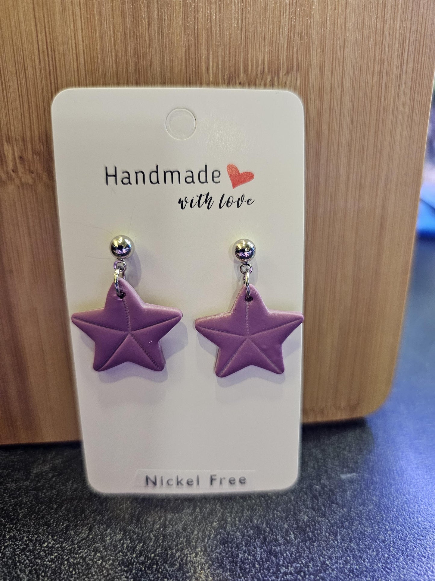 Purple starfish polymer clay earrings