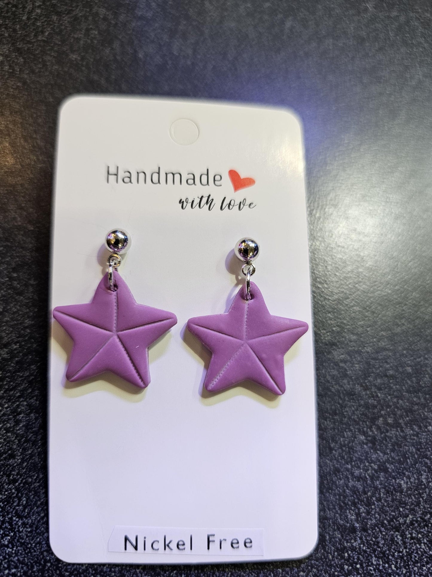 Purple starfish polymer clay earrings