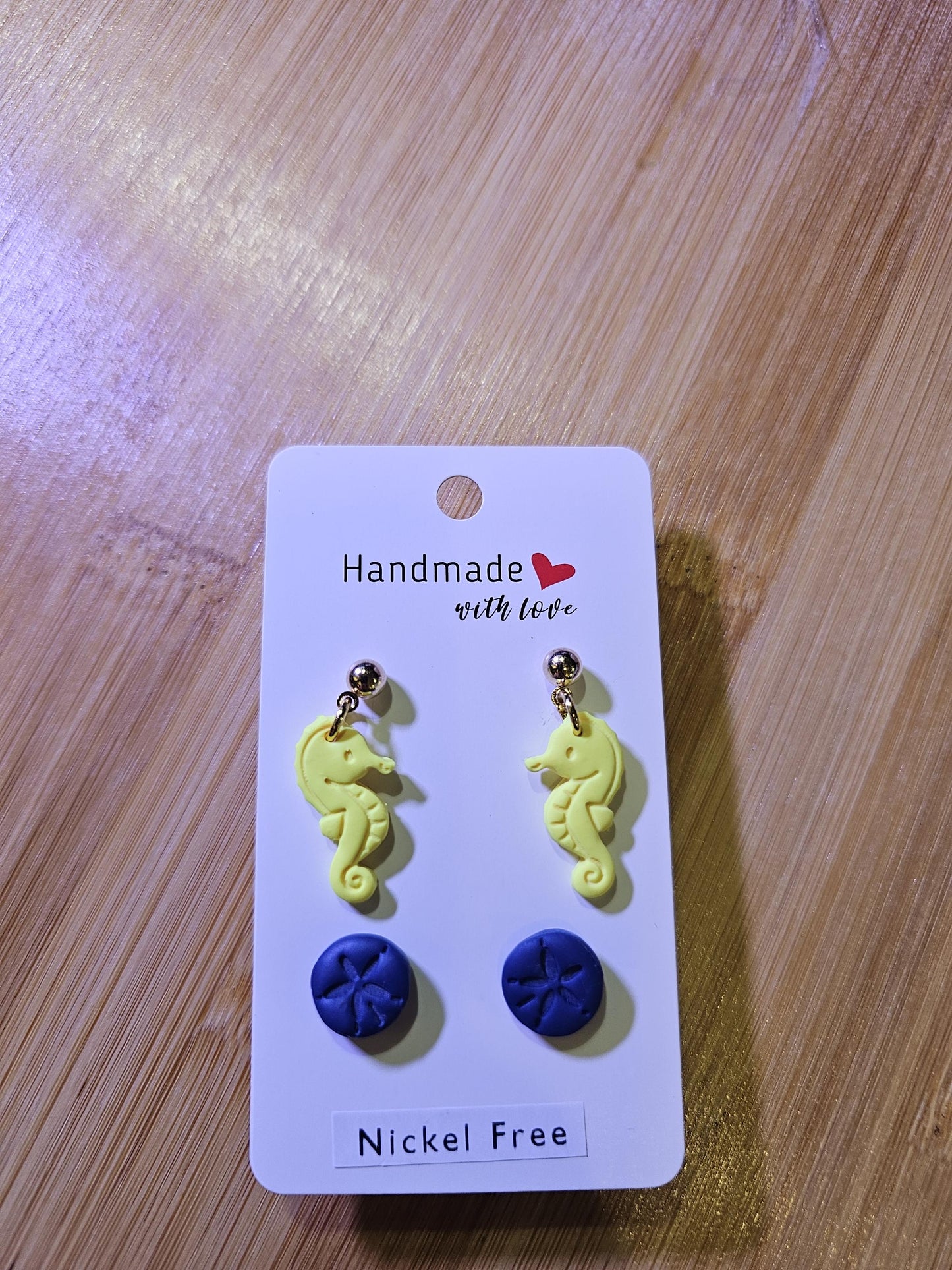 Seahorse and sand dollar polymer clay earrings